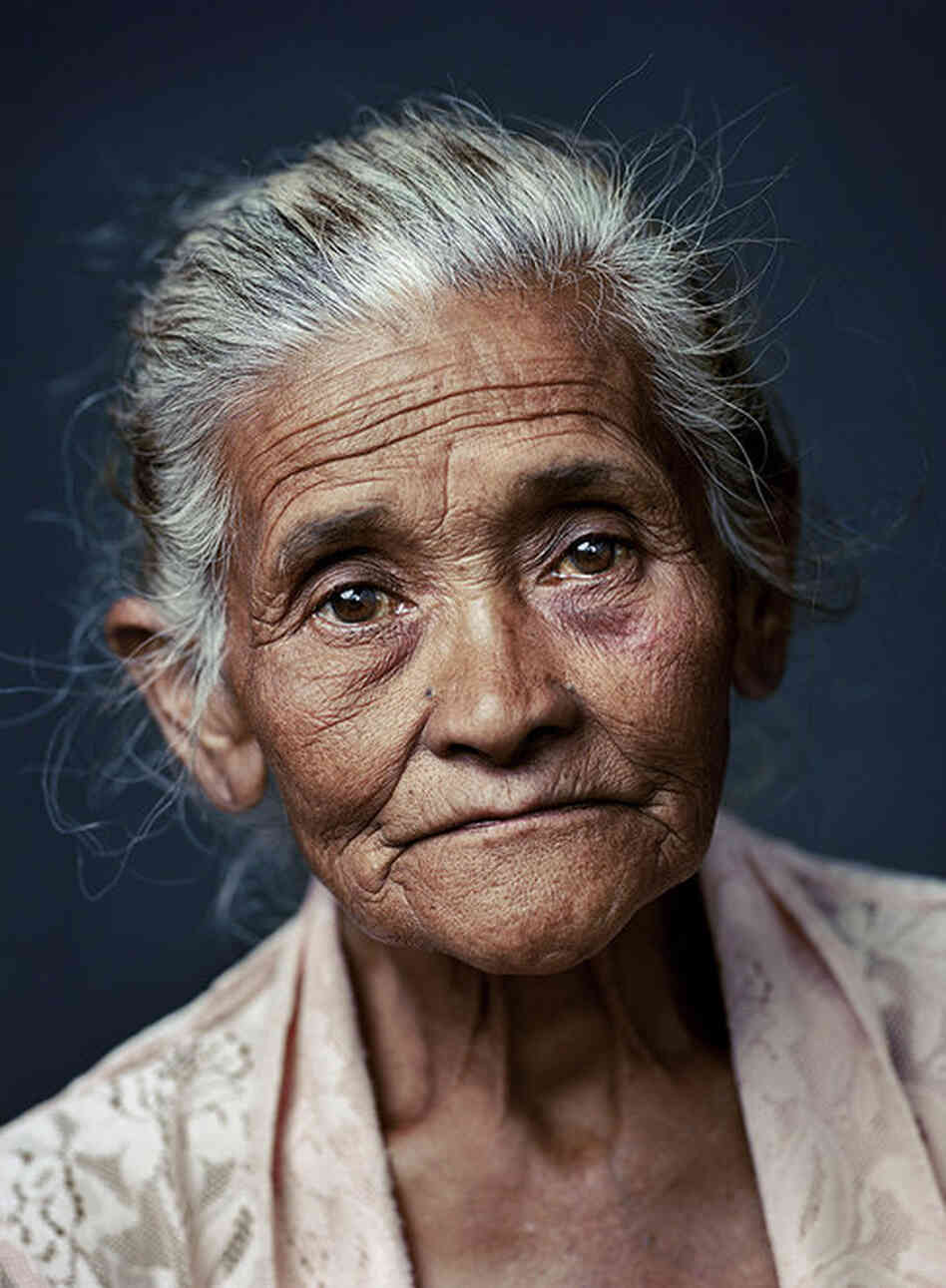 Paini, born 1930, Getasan, Central JavaFrom age 13, Paini was forced into labor at a local barracks. She gathered food, dug ditches and worked in the kitchen — and in the evening was taken from home to the barracks and raped repeatedly. The man Paini was to marry through an arranged marriage disowned her after the war.