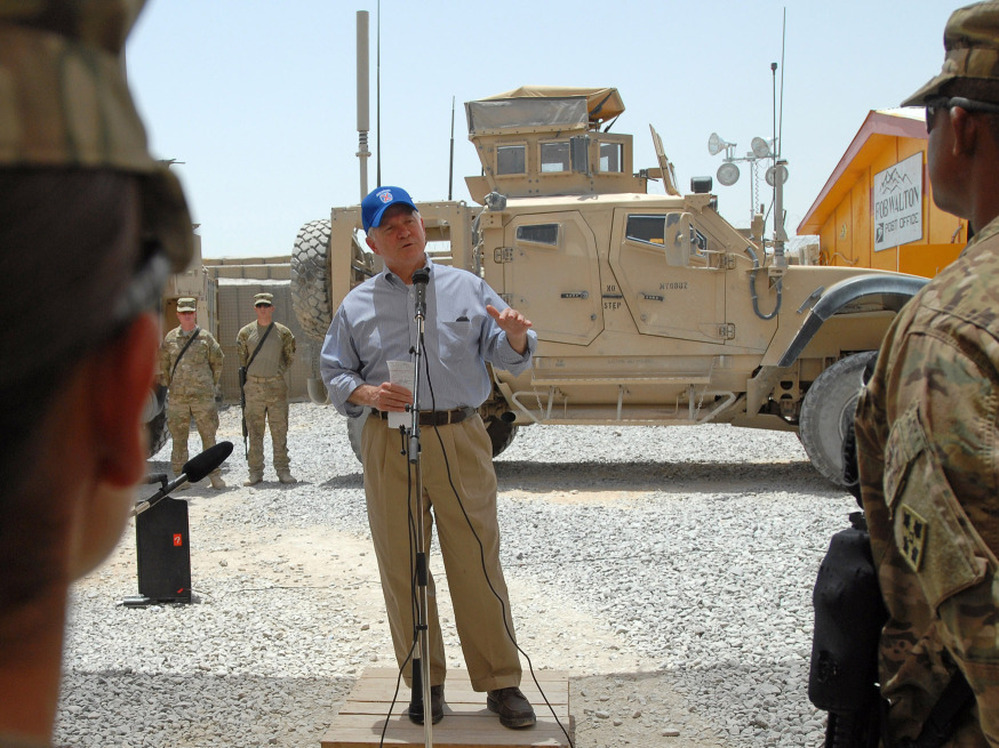Defense Secretary Robert Gates has sought to raise rates on military health insurance paid by working-age retirees. This week, he spoke to troops at Forward Operating Base Walton in Kandahar, Afghanistan.