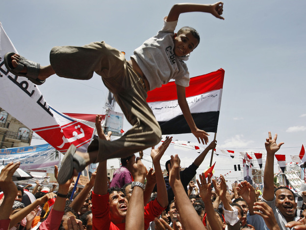 In the capital, Sanaa, on Sunday, some Yemeni anti-government protesters celebrated Saleh's departure.