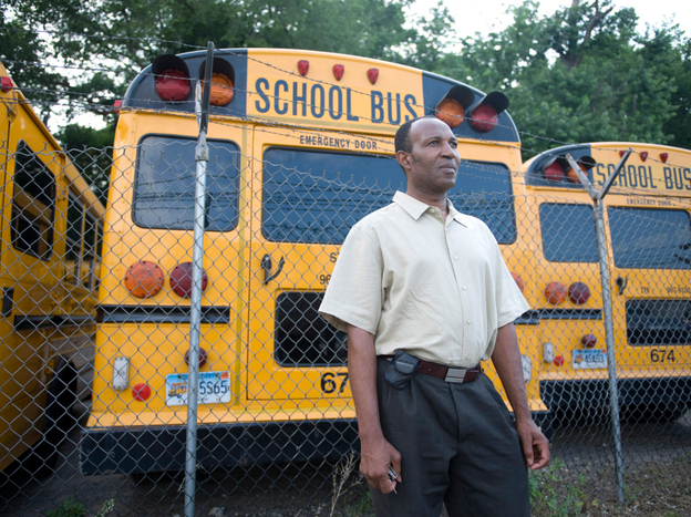 School bus driver Jamille Aine, shown here in 2008, worked for an employer in Connecticut that didn't offer paid sick days; a prolonged illness could have imperiled his ability to pay bills. A bill the state's governor has promised to sign would give workers in companies with 50 or more employees a week of paid sick time.