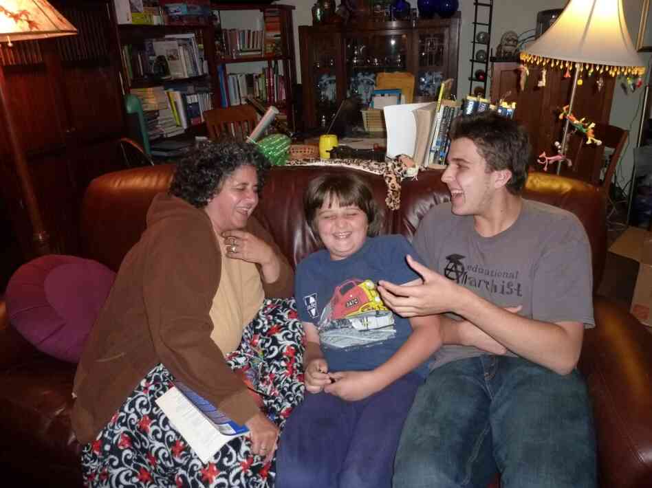 Sam (right) with his mother, Pam Tellew, and his younger brother Nicky.
