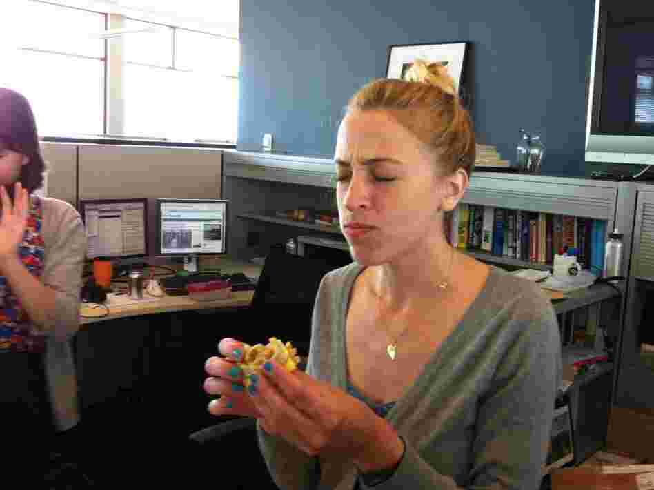 It may seem like Eva's savoring this sandwich. In reality, she's concentrating to keep the memory of it from sticking to her brain.