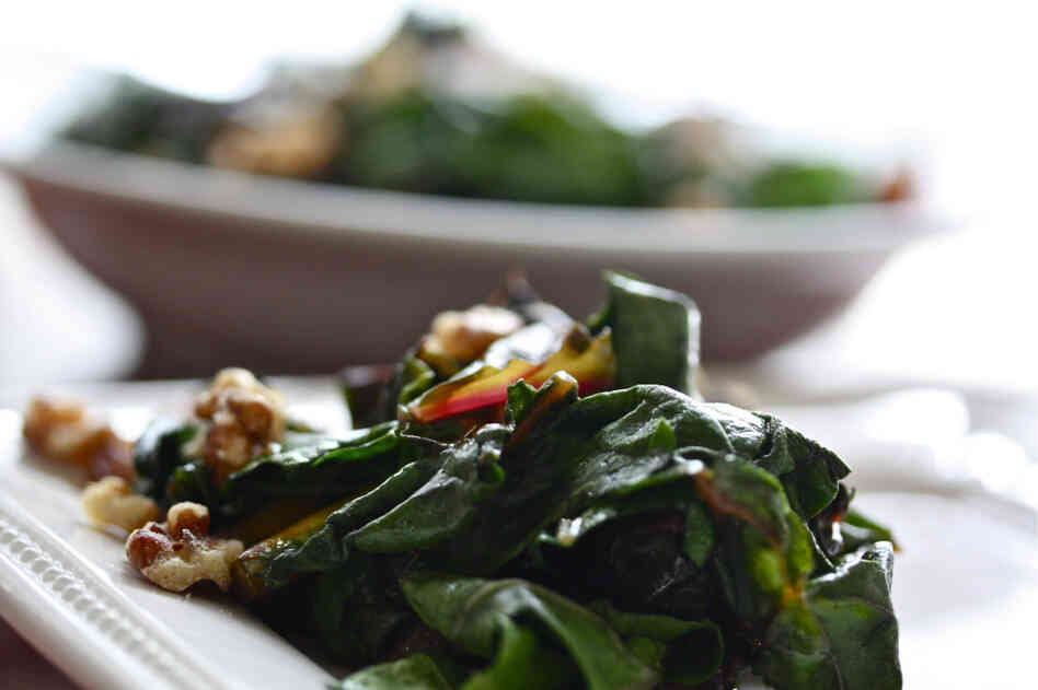The trick to CSA-share cooking is to embrace what you get. Check the farm's website and other online resources for recipe ideas — like Wilted Greens With Caramelized Red Onion And Toasted Walnuts.