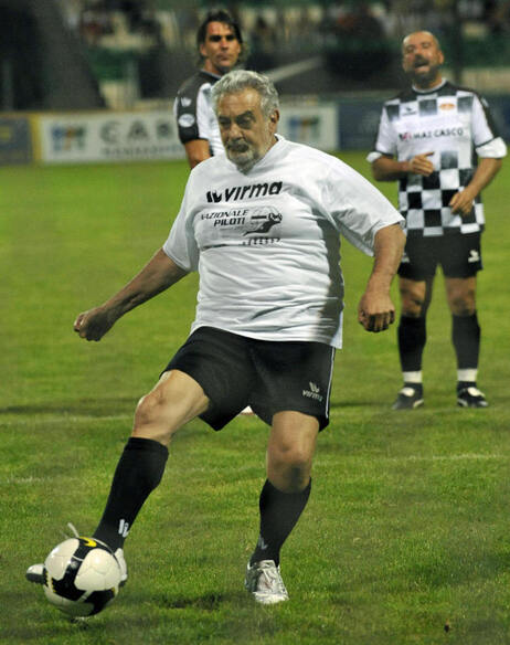 Placido Domingo kicks a penalty shot in a July 2008 charity soccer match held in Hungary. Placido Domingo kicks a penalty shot in a July 2008 charity soccer match held in Hungary.