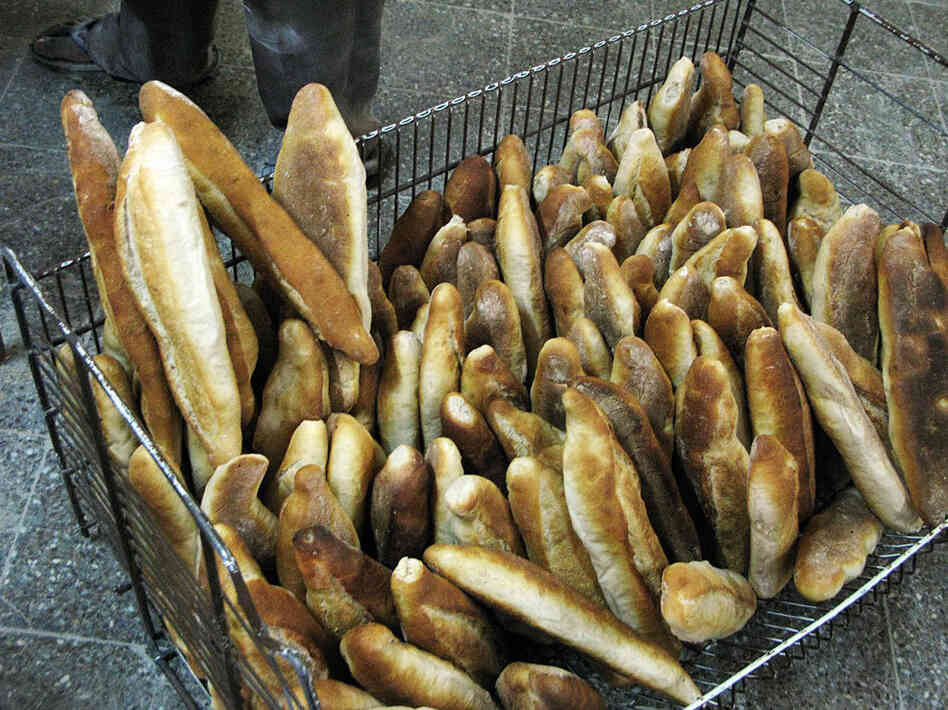 The Padaria Allianca, a bakery in Maputo, the capital of Mozambique, turns out 12,000 loaves of bread a day. The Mozambican government is planning to end flour subsidies it can't afford, putting the bakery's business in doubt. The Padaria Allianca, a bakery in Maputo, the capital of Mozambique, turns out 12,000 loaves of bread a day. The Mozambican government is planning to end flour subsidies it can't afford, putting the bakery's business in doubt.