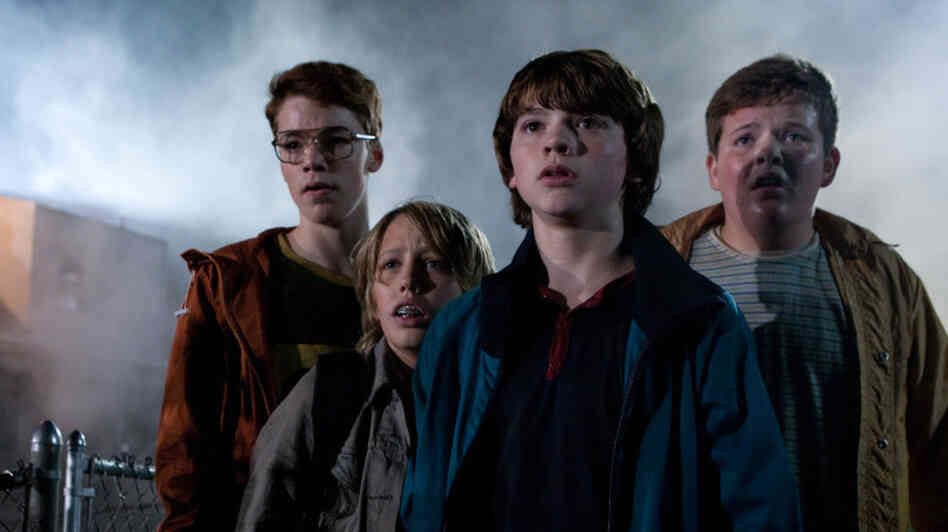 'Super' 4: Gabriel Basso (left), Ryan Lee, Joel Courtney and Riley Griffiths play teenagers shooting a homemade movie when a spectacular crash draws them into a world they weren't supposed to know about.