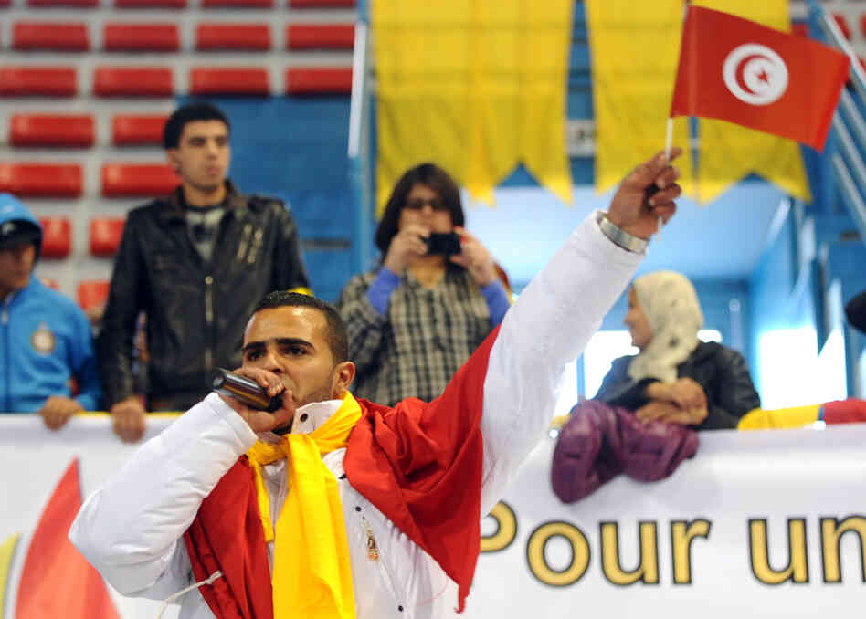Hamada Ben Amor, also known as "El General," performs during the first meeting of Tunisia's main opposition party on Jan. 29, in Tunis. Hamada Ben Amor, also known as "El General," performs during the first meeting of Tunisia's main opposition party on Jan. 29, in Tunis.