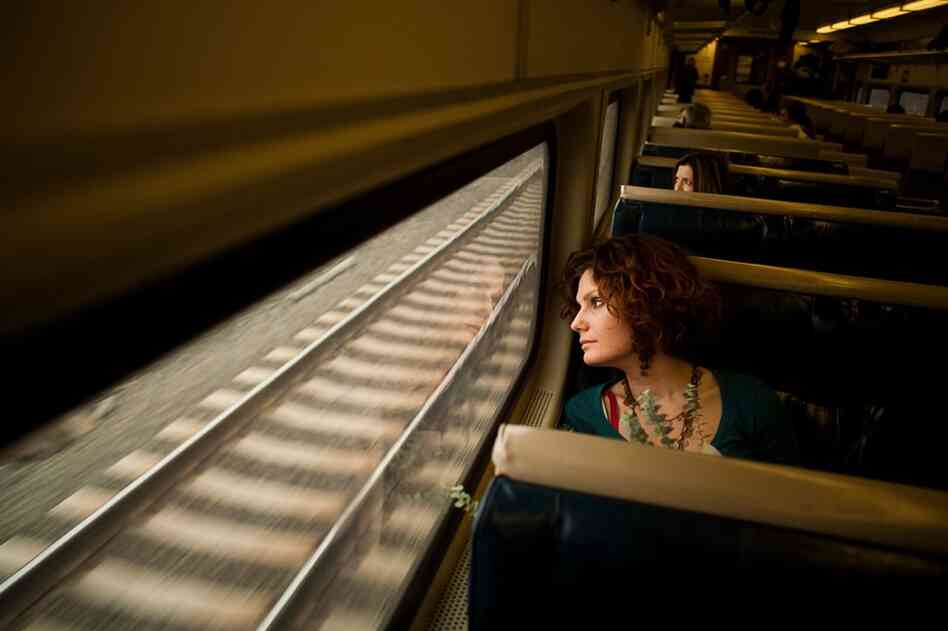 Anna riding the train.