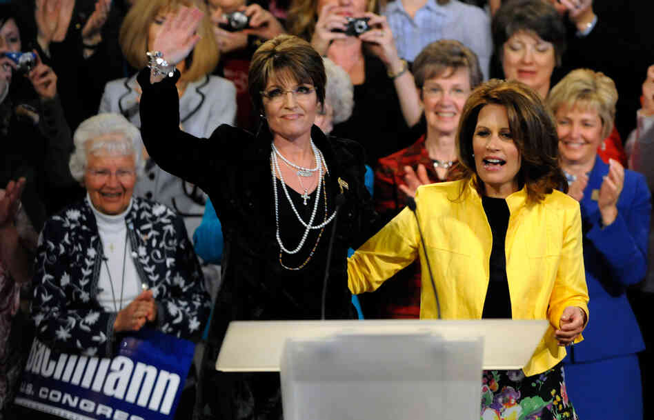 Former Republican vice presidential nominee Sarah Palin (left) waves to the crowd after a campaign appearance in Minneapolis for Rep. Michele Bachmann (R-MN) on April 7, 2010. Former Republican vice presidential nominee Sarah Palin (left) waves to the crowd after a campaign appearance in Minneapolis for Rep. Michele Bachmann (R-MN) on April 7, 2010.