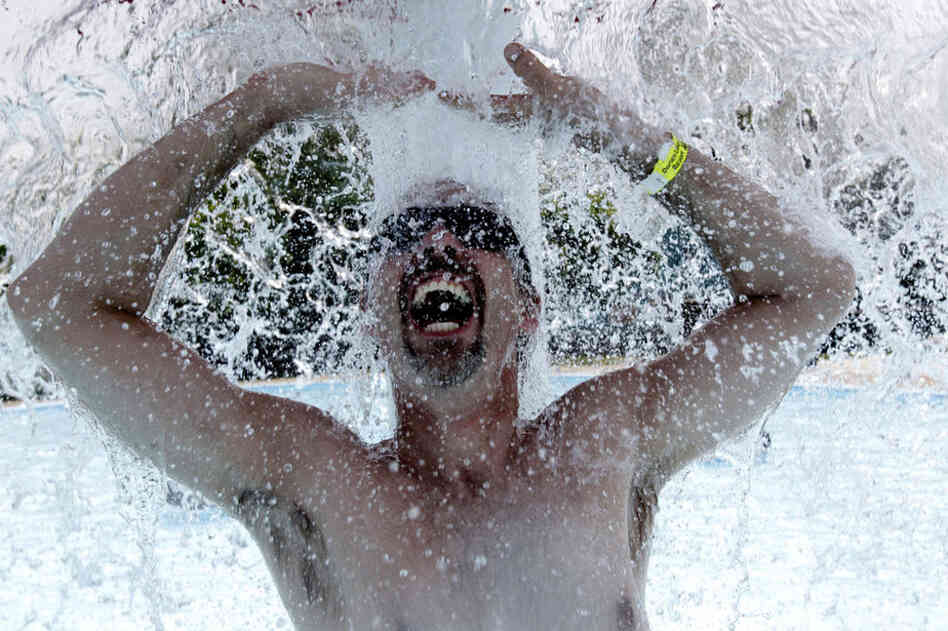 Randy Lovesky cools off in the water park at Darien Lake Theme Park Resort in Darien Center, N.Y. The blazing heat was forecast to subside in the Northeast by Friday. 