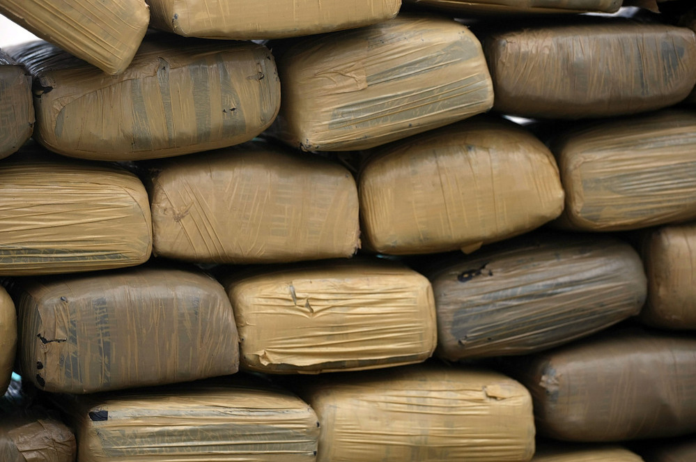 Bricks of confiscated marijuana are stacked in Miami Beach, Florida in September of 2009.