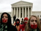 Members of Bound 4 Life, a group opposed to abortion rights, pray in front of the U.S. Supreme Court in early 2006. Members of Bound 4 Life, a group opposed to abortion rights, pray in front of the U.S. Supreme Court in early 2006.
