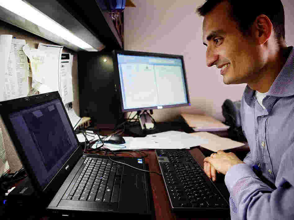 Dr. Ray Dorsey video chats with his patient, Victor Jarzombeck, from his office at Johns Hopkins Medical Center in Baltimore.  Dorsey has been treating Jarzombeck, who lives nearly 350 miles away in New Hartford, N.Y., for three years.