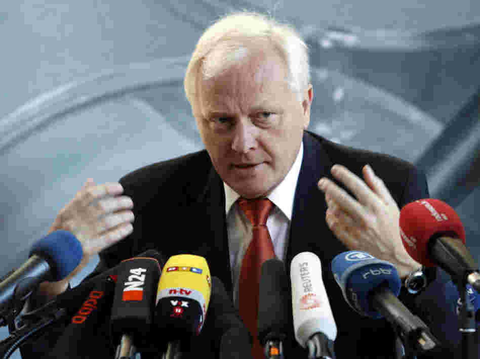 Reinhard Burger, president of the Robert Koch Institute, tells reporters in Berlin Friday that sprouts from a German farm are the cause of the country's massive foodborne illness outbreak.