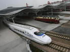 The CRH2 China Railways high-speed bullet train, departing a Shanghai station in February 2007, is capable of speeds of more than 150 mph. The CRH2 China Railways high-speed bullet train, departing a Shanghai station in February 2007, is capable of speeds of more than 150 mph.