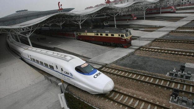 The CRH2 China Railways high-speed bullet train, departing a Shanghai station in February 2007, is capable of speeds of more than 150 mph. The CRH2 China Railways high-speed bullet train, departing a Shanghai station in February 2007, is capable of speeds of more than 150 mph.