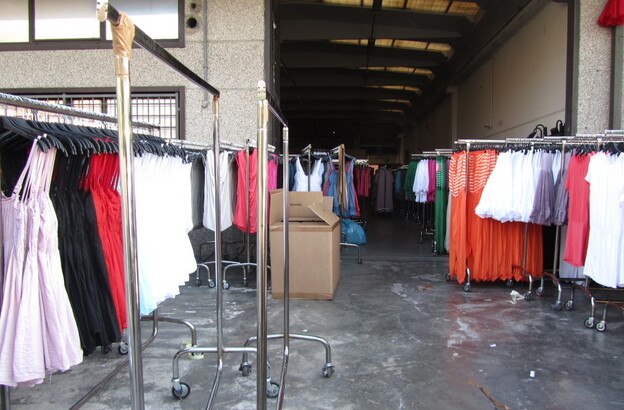 At the Macrolotto industrial park, home of pronto moda — or fast fashion — warehouse after warehouse is filled with racks of low-end, trendy women's garments.