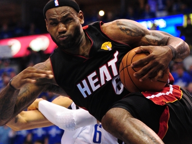 LeBron James of the Miami Heat heads to the basket against the Dallas Mavericks during Game 5 of the NBA Finals. James chose to play with the Heat in hopes of winning an NBA championship.