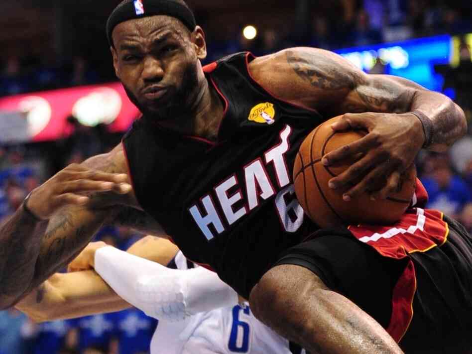 LeBron James of the Miami Heat heads to the basket against the Dallas Mavericks during Game 5 of the NBA Finals. James chose to play with the Heat in hopes of winning an NBA championship.