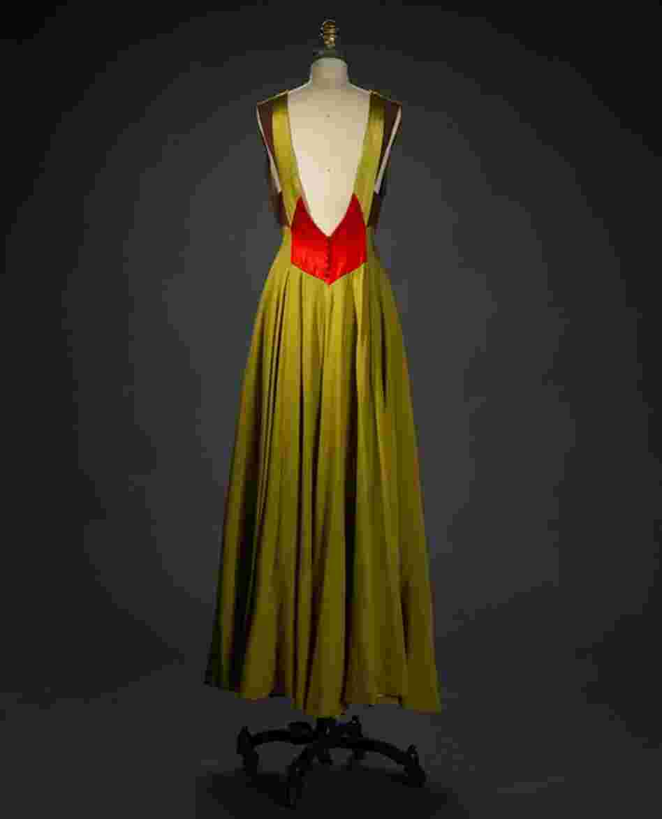 Evening dress, ca. 1950, by Philip HulitarNylon, acetate, cotton, gauze weave, Alencon-type machine lace, hand appliqued