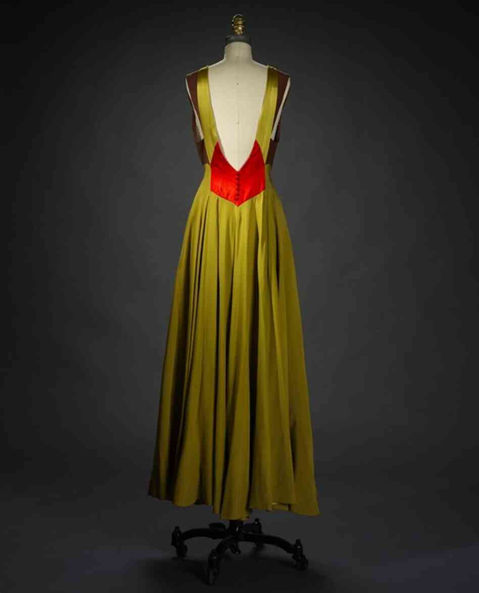 Evening dress, ca. 1950, by Philip HulitarNylon, acetate, cotton, gauze weave, Alencon-type machine lace, hand appliqued
