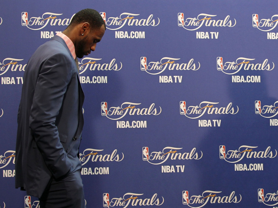 LeBron James enters the interview room.