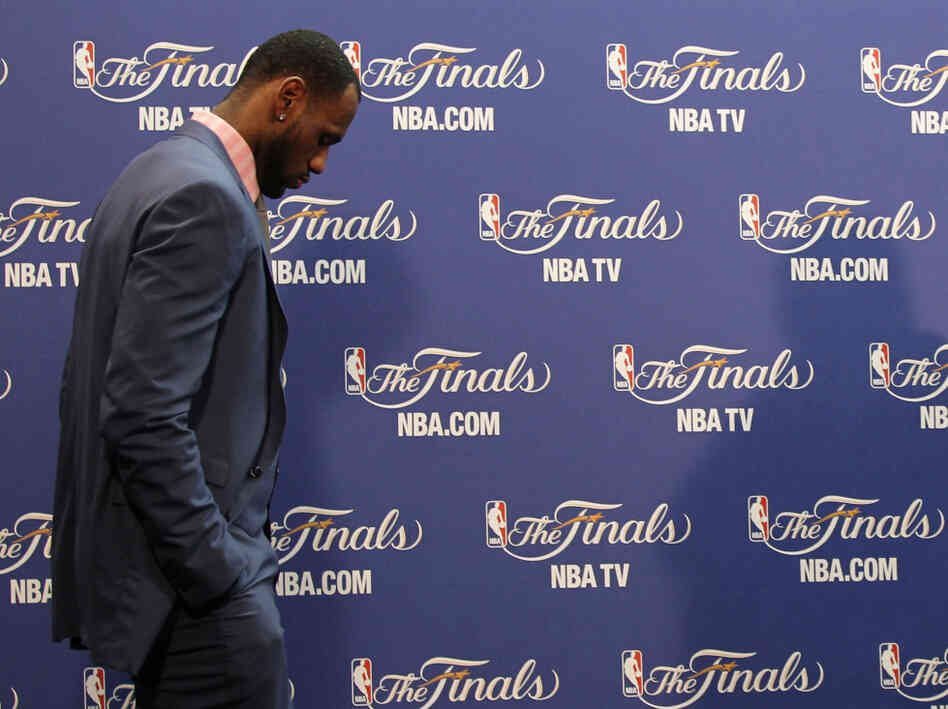 LeBron James enters the interview room.