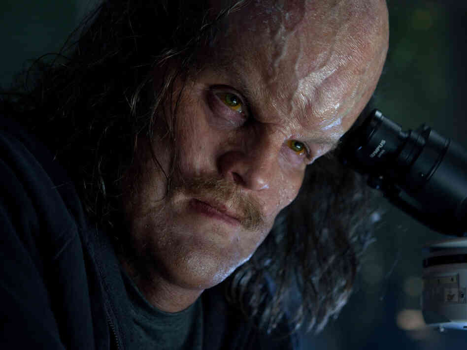 Hector Hammond (Peter Sarsgaard) is an exobiologist with a big-head complex. Hammond's story is just one of the many subplots crammed uncomfortably into Green Lantern.