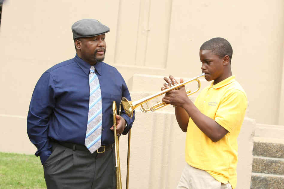Antoine Batiste (Wendell Pierce) instructs his young band student in Treme, played by Jaron Williams. Antoine Batiste (Wendell Pierce) instructs his young band student in Treme, played by Jaron Williams.