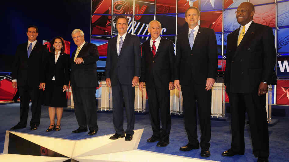 Left to right: Former Sen. Rick Santorum; Rep. Michele Bachmann; former House Speaker Newt Gingrich; former Massachusetts Gov. Mitt Romney; Rep. Ron Paul; former Minnesota Gov. Tim Pawlenty; entrepreneur Herman Cain.