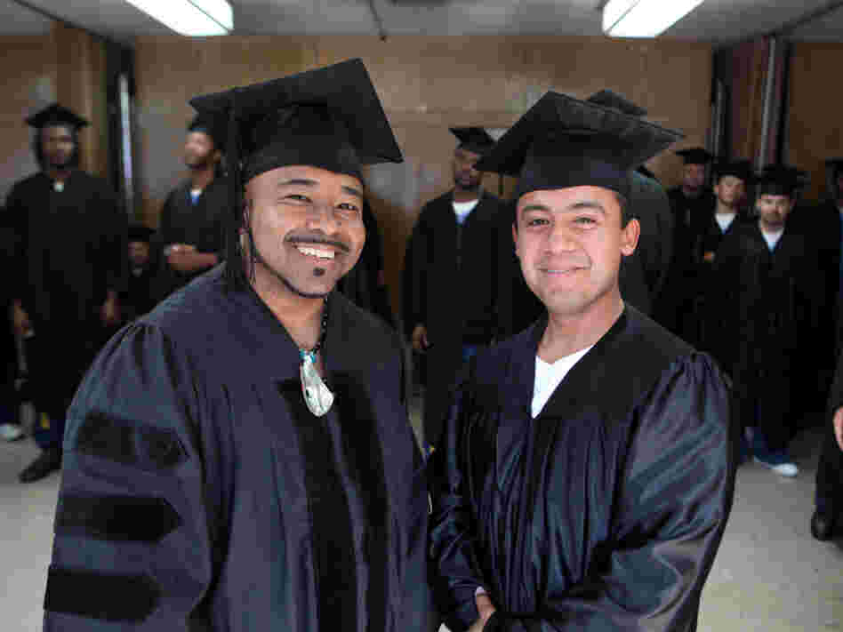 Phillip Senegal (left) and valedictorian Felix Lucero earned associate of arts degrees in 2009 at a ceremony in San Quentin state prison, where they are inmates. The college program is an extension of Patten University in Oakland, Calif.