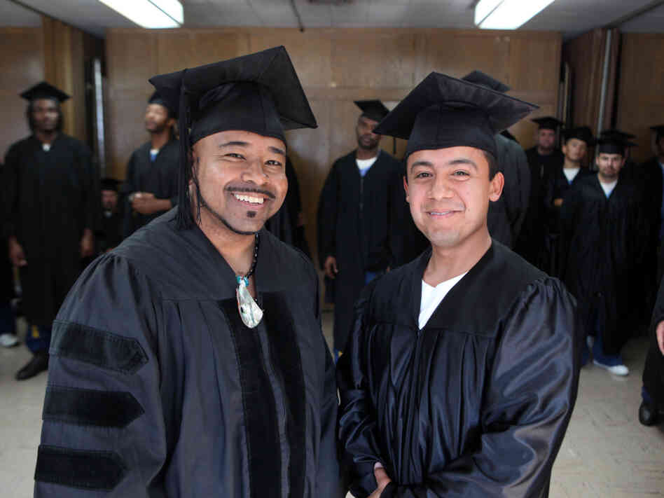 Phillip Senegal (left) and valedictorian Felix Lucero earned associate of arts degrees in 2009 at a ceremony in San Quentin state prison, where they are inmates. The college program is an extension of Patten University in Oakland, Calif.