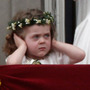 Perhaps it wasn't just the crowd noise that was bothering little Grace van Cutsem on the balcony of Buckingham Palace.