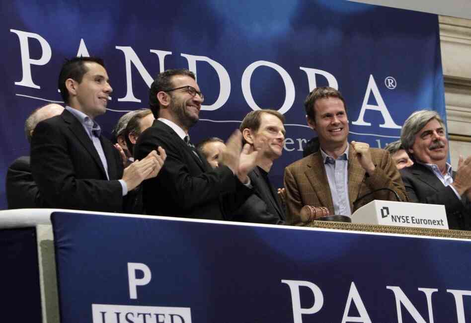 Joe Kennedy, third from left, CEO & President, and Tim Westergren, fourth from left, Chief Strategy Officer & Founder, of Pandora internet radio at the NYSE ringing the opening bell. Joe Kennedy, third from left, CEO & President, and Tim Westergren, fourth from left, Chief Strategy Officer & Founder, of Pandora internet radio at the NYSE ringing the opening bell.