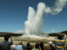 Tourists watch the 'Old Faithful' geyser which erupts on average every 90 minutes in the Yellowstone National Park, Wyoming on June 1, 2011. In our second hour, guests give tips on how to be a traveler, not a tourist. Tourists watch the 'Old Faithful' geyser which erupts on average every 90 minutes in the Yellowstone National Park, Wyoming on June 1, 2011. In our second hour, guests give tips on how to be a traveler, not a tourist.
