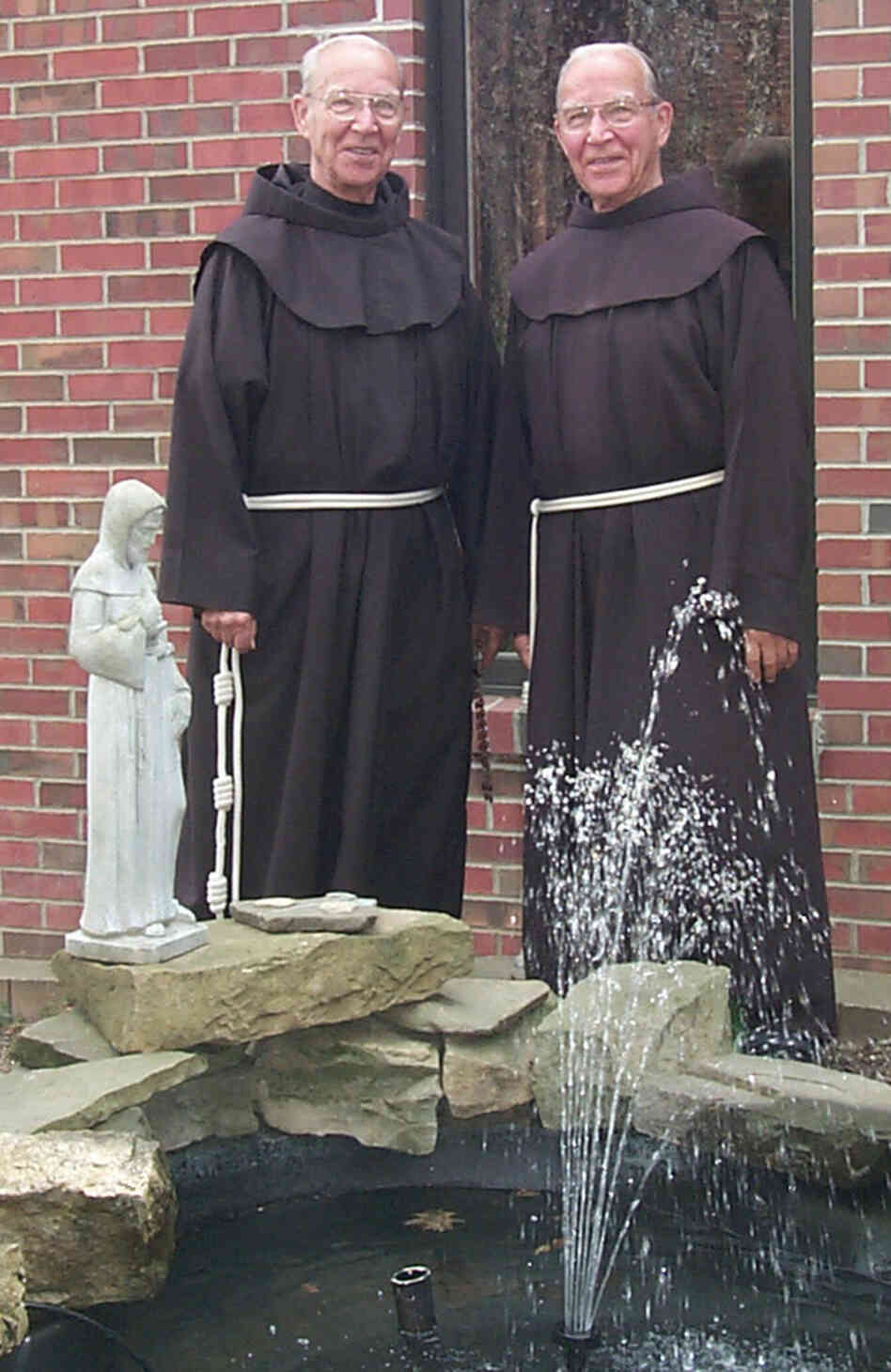 May 2003 photo provided by St. Bonaventure University of shows Adrian, left, and Julian Riester, identical twins and brothers in the Order of Friars Minor.