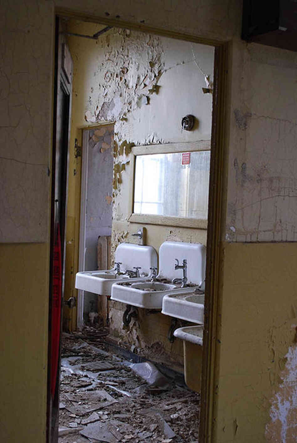 The National Soldiers Home is badly deteriorating. Above, water damage in a restroom at Ward Theater. 