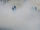 A cloud of tear gas surrounded demonstrators in Athens earlier today (June 15, 2011). A cloud of tear gas surrounded demonstrators in Athens earlier today (June 15, 2011).