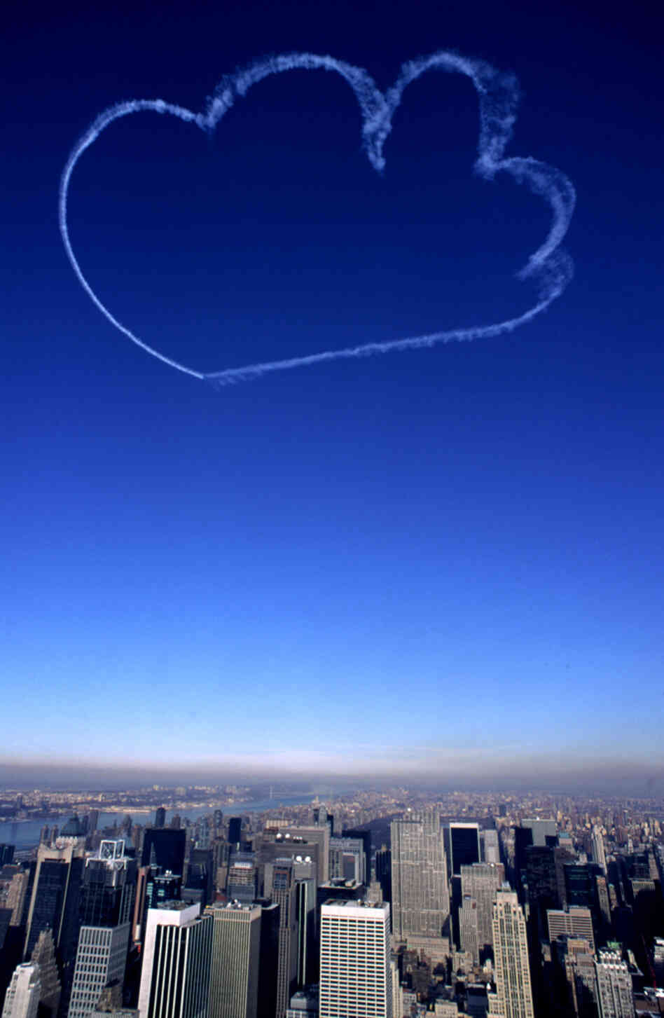 Clouds by Vik Muniz, skywriting over New York City Clouds by Vik Muniz, skywriting over New York City