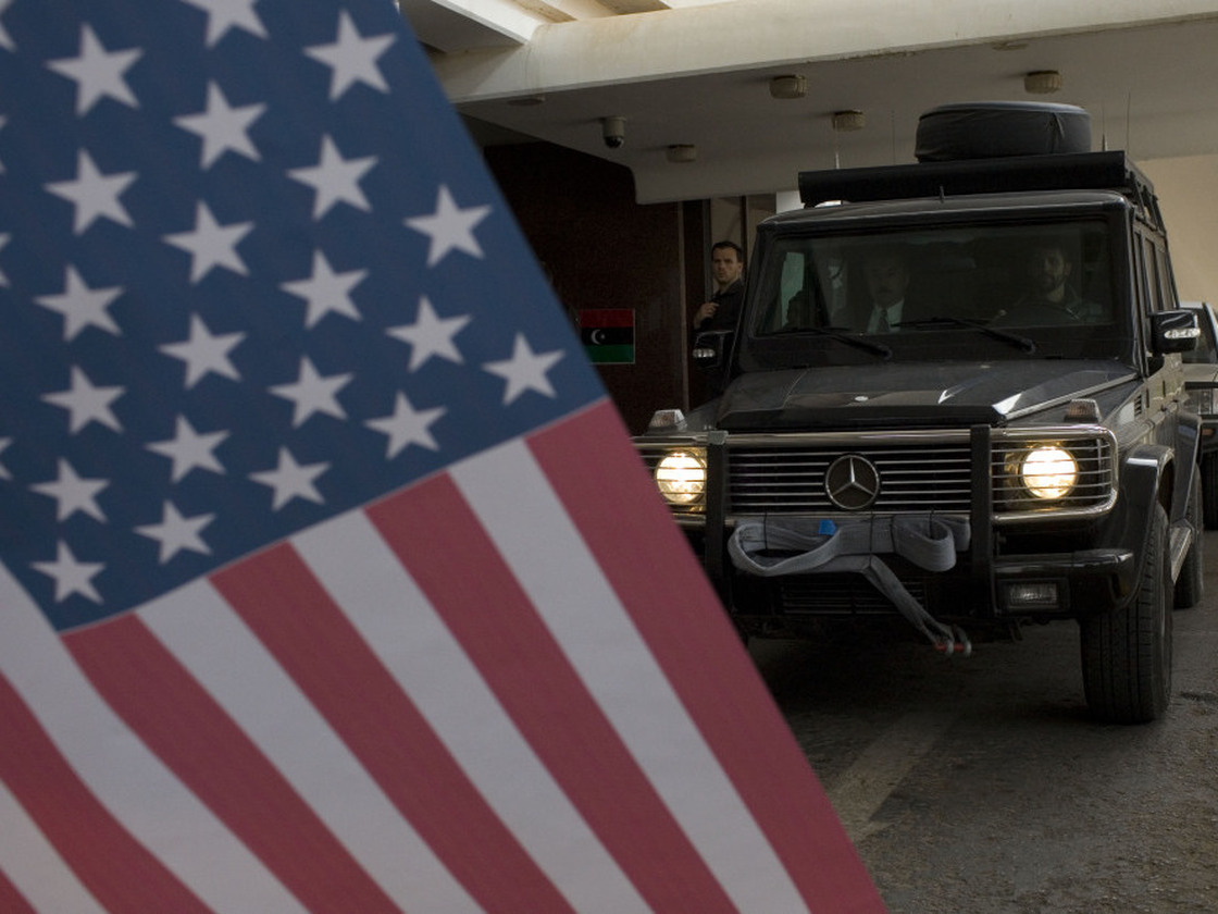 Sen. John McCain's convoy leaves the Tebisty Hotel in Benghazi, Libya in April 2011. McCain's national security hawkishness is shared by fewer Republicans.