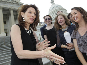 Rep. Michele Bachmann, R-Minn., greets supporters and well-wishers on the steps of the House of Representatives in Washington, June 16, 2011. Rep. Michele Bachmann, R-Minn., greets supporters and well-wishers on the steps of the House of Representatives in Washington, June 16, 2011.