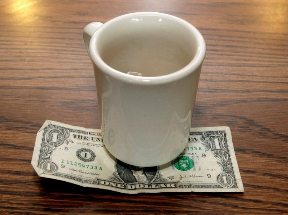 A tip is left by a customer at Linda's Place Restaurant in St. Clair Shores, Mich., Thursday, June 19, 2008