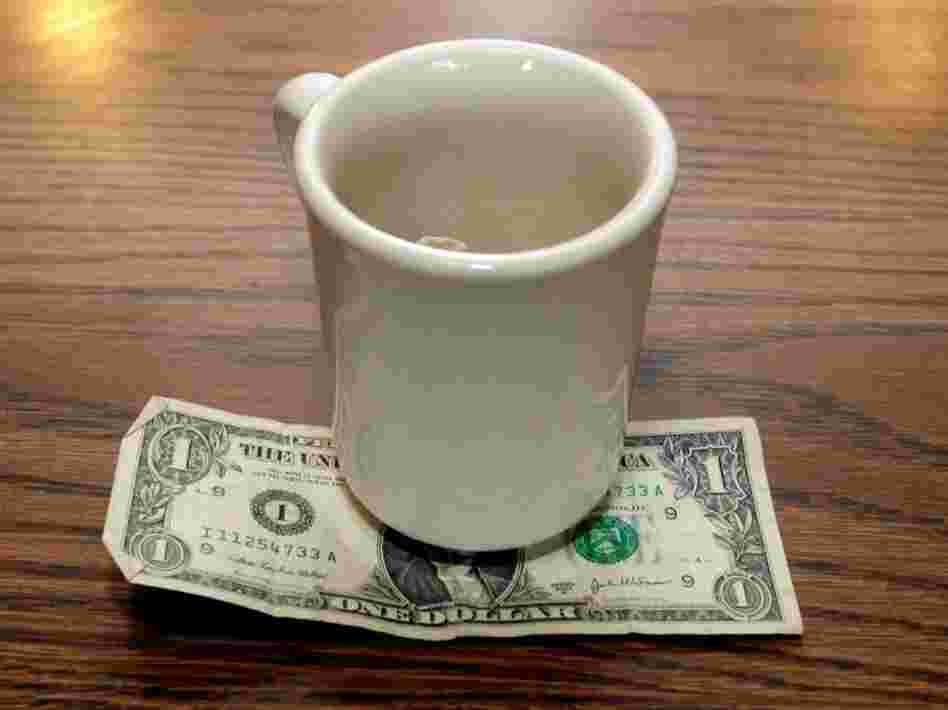 A tip is left by a customer at Linda's Place Restaurant in St. Clair Shores, Mich., Thursday, June 19, 2008