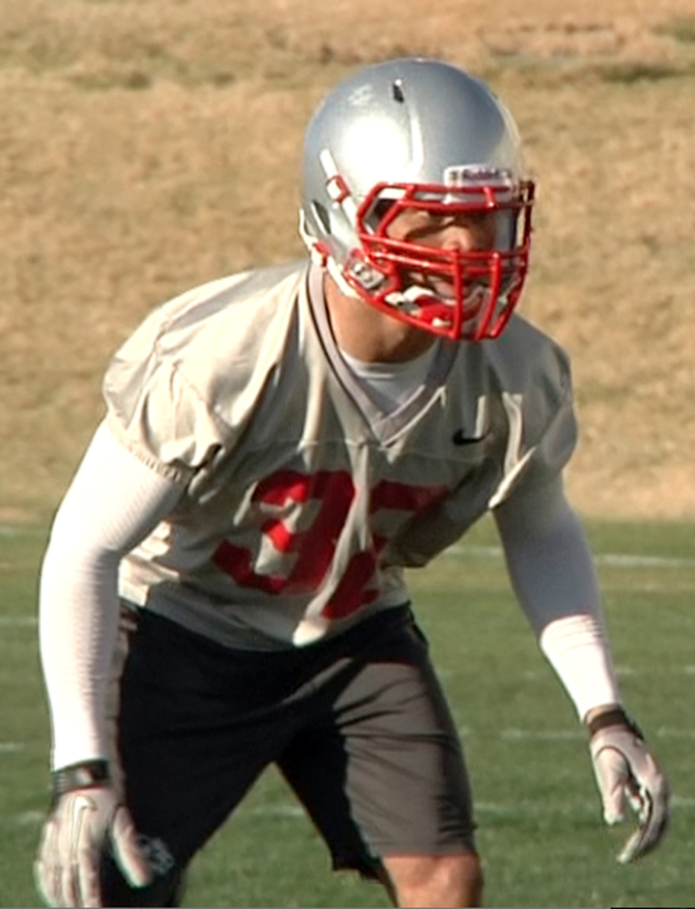 In an image taken from an April 2011 video, provided by the University of New Mexico, Deshon Marman takes part in football practice in Albuquerque, N.M.