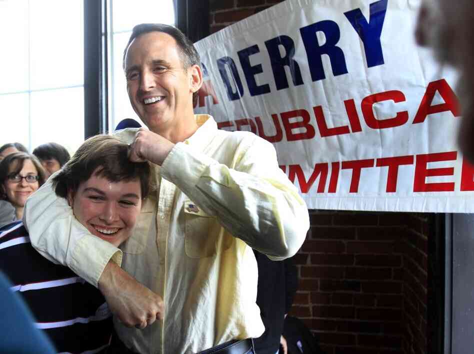Tim Pawlenty gives a young man a noogie at a New Hampshire meet-and-greet.