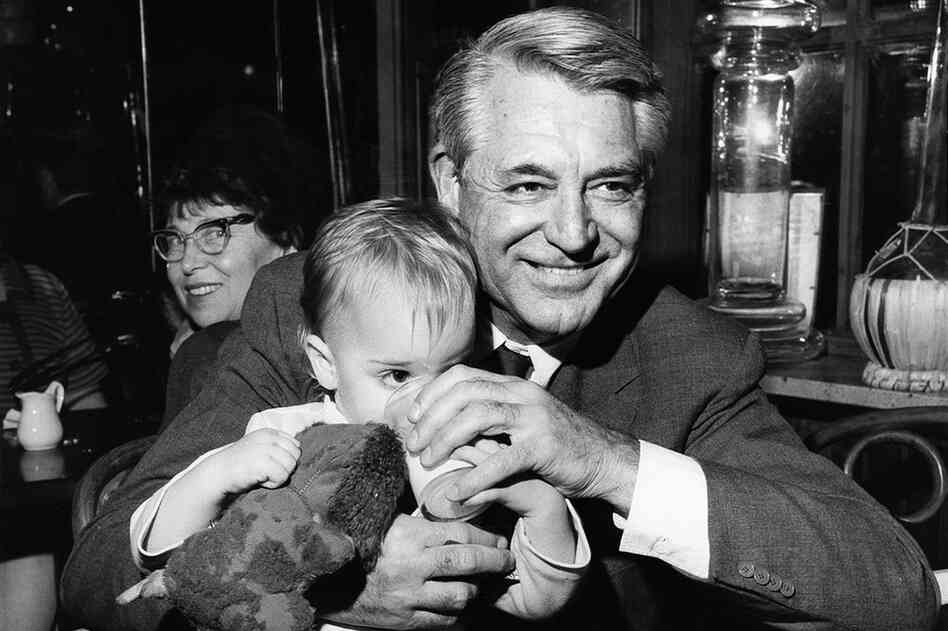 Jennifer Grant, daughter of actor Cary Grant, says she titled her book after one of her father's favorite expressions, "good stuff," which he used to declare his happiness. Here, Grant sits with his daughter at a restaurant in the 1960s New York.