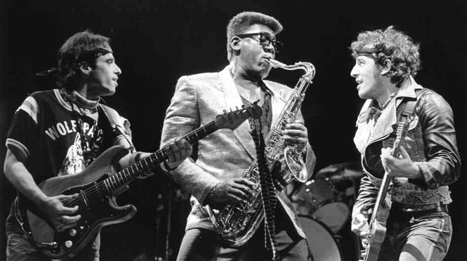 Nils Lofgren, Clarence Clemons and Bruce Springsteen onstage.