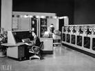 Two men operate the enormous UNIVAC (UNIVersal Automatic Computer) in 1960. Two men operate the enormous UNIVAC (UNIVersal Automatic Computer) in 1960.