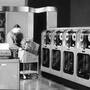 Two men operate the enormous UNIVAC (UNIVersal Automatic Computer) in 1960.
