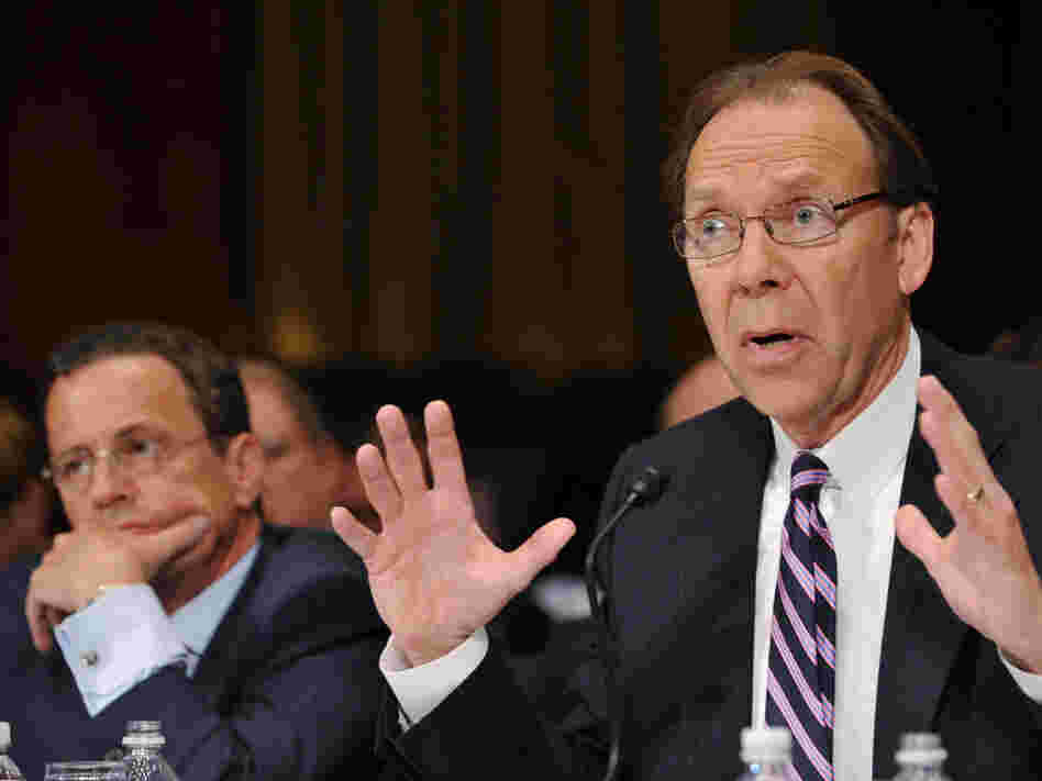 Sprint CEO Daniel Hesse (right) testifies against the proposed AT&T merger with T-Mobile USA last month at a Senate Judiciary Committee hearing as T-Mobile USA President and CEO Philipp Humm looks on.